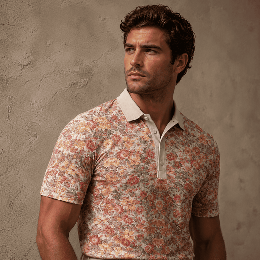 Man wearing a floral patterned shirt against a textured wall
