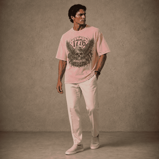Man wearing a pink USA 250th Anniversary Shirt with a graphic design against a plain background