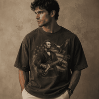 Man wearing a t-shirt with a graphic of a historical figure Abraham Lincoln playing a guitar against an American flag.