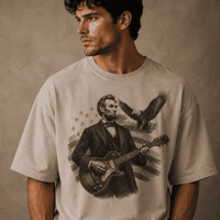 Man wearing a t-shirt with a graphic of a historical figure Abraham Lincoln playing a guitar against an American 