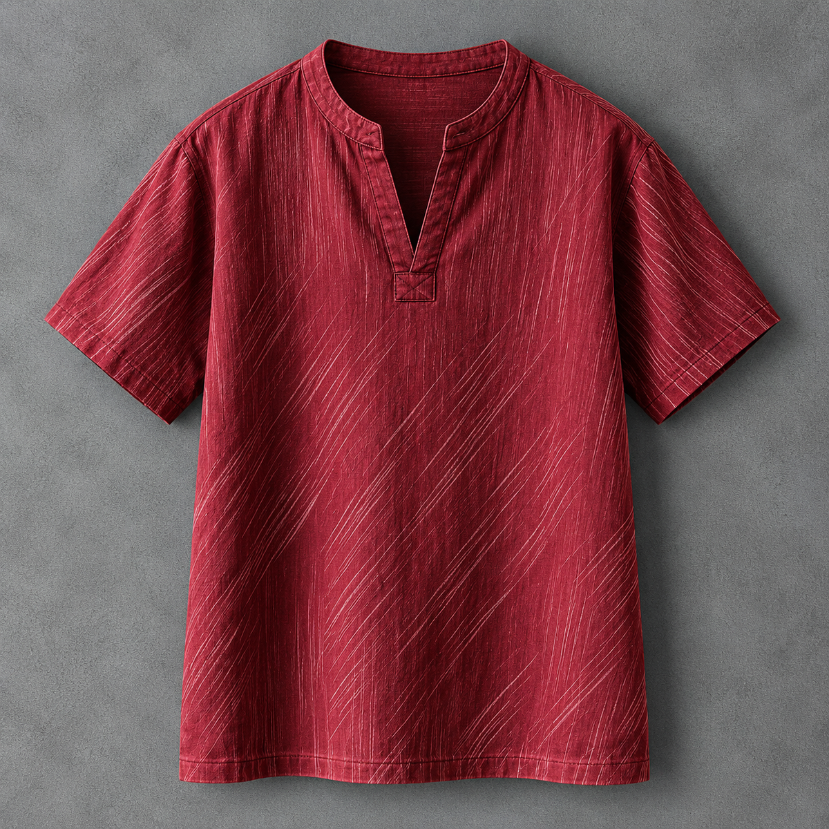 A short-sleeve red linen Henley t-shirt with a textured diagonal stripe pattern, displayed flat against a gray background.