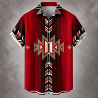 A short-sleeve button-up shirt with a bold Southwestern geometric pattern in red, black, white, and gray, displayed against a textured gray background.