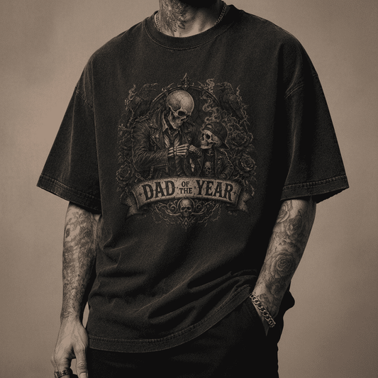 Person wearing a black t-shirt with 'Dad of the Year' graphic design on a dark background