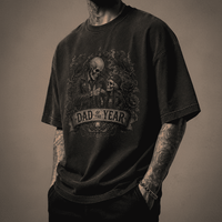 Person wearing a black t-shirt with a graphic design and text on a dark background