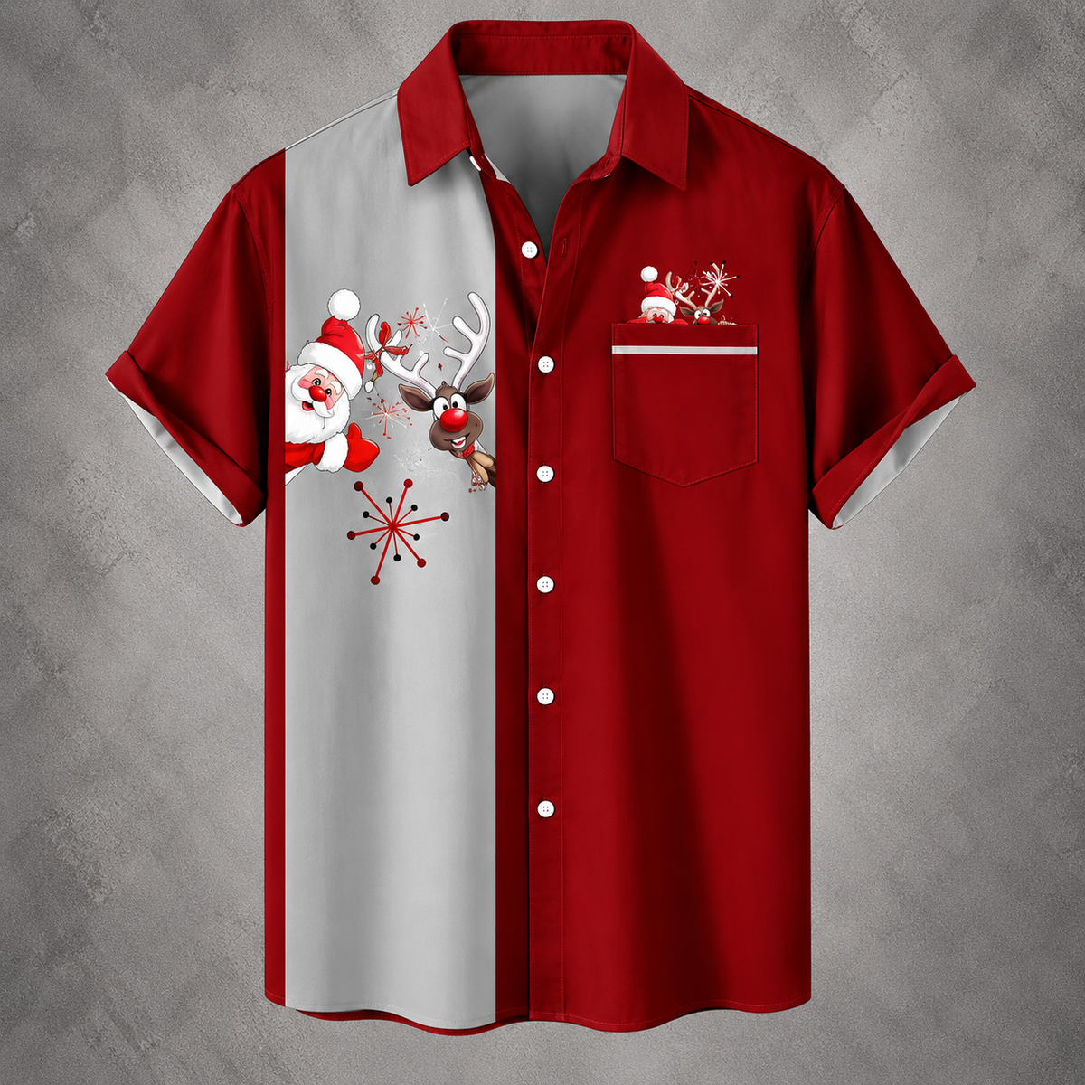 A red short-sleeve button-up shirt with a vertical light gray panel on the front featuring a Christmas graphic of Santa Claus and a reindeer, plus a chest pocket with a small holiday print.