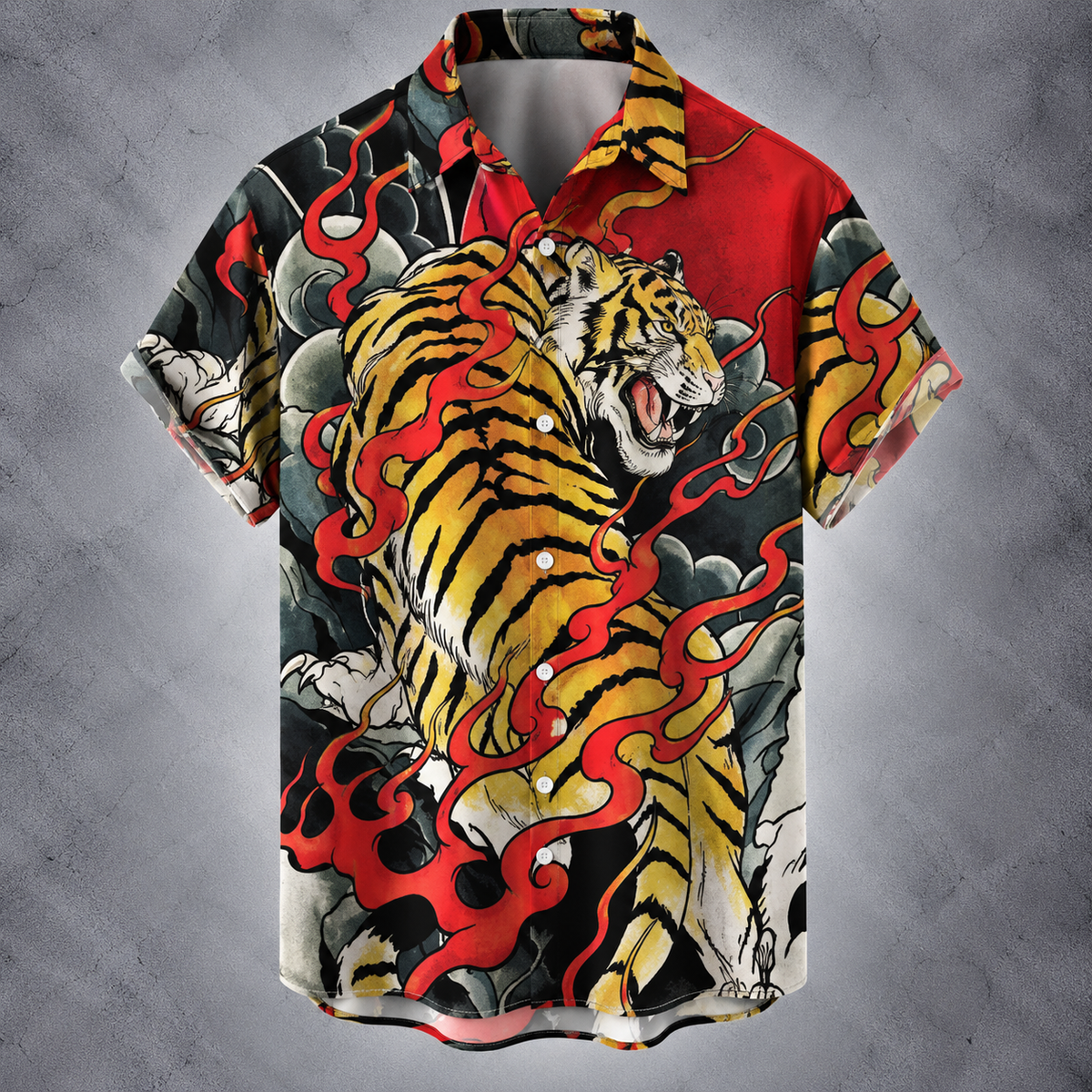 A short-sleeve button-up camp shirt featuring a bold graphic print of a roaring tiger surrounded by red flames and gray clouds, displayed against a textured gray background.