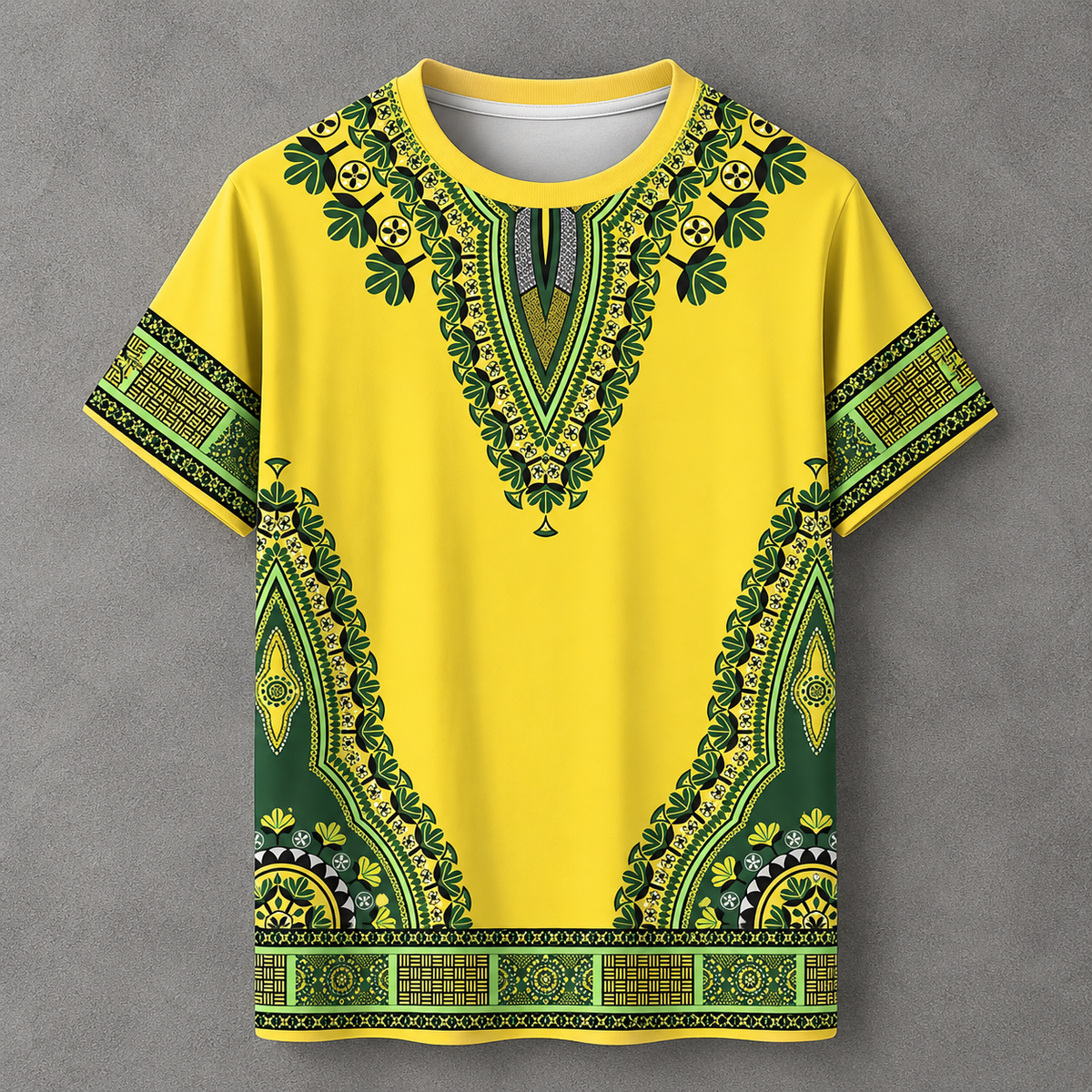 A bright yellow short-sleeve t-shirt with an all-over green and black African dashiki-style print, shown flat against a textured gray background.