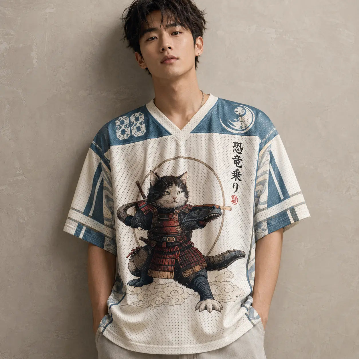 Person wearing a sports jersey with a cat in samurai armor design on a plain background