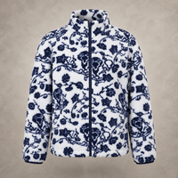 A white fleece jacket with a navy blue floral and branch pattern, featuring a full front zipper and stand-up collar, shown against a textured beige background.