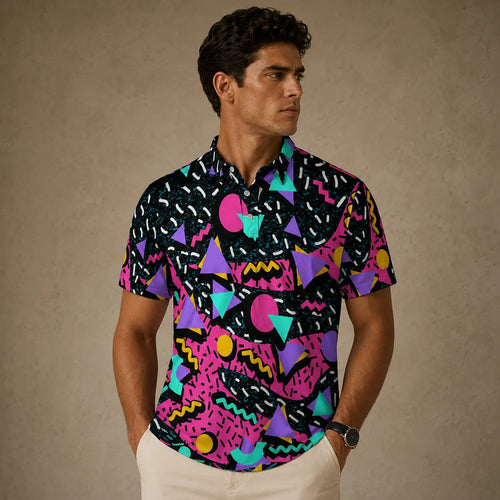 Man wearing a colorful geometric patterned shirt against a beige background