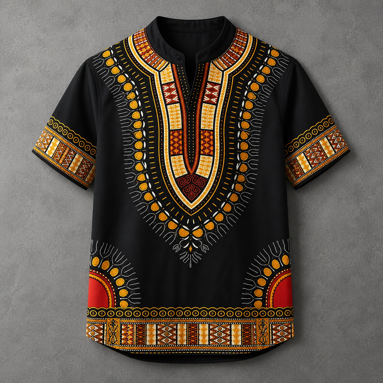 A men's short-sleeve buttonless shirt with a black base and vibrant African dashiki-style patterns in yellow, orange, red, and white, displayed flat against a textured gray background.