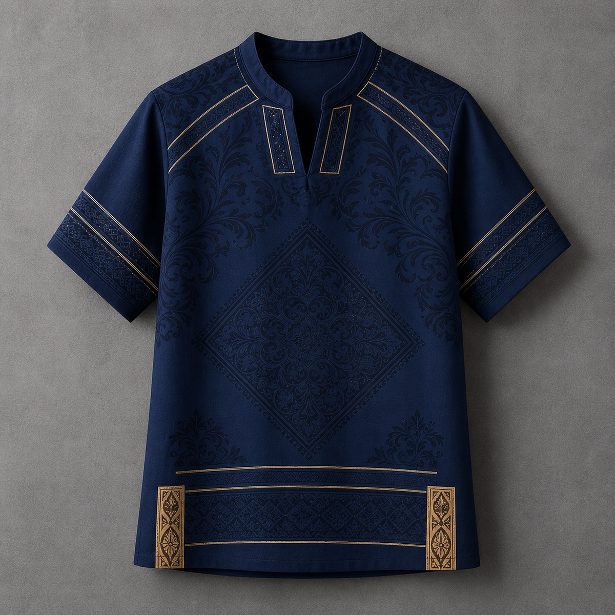 A navy blue short-sleeve tunic top with gold geometric and floral patterns, displayed flat against a textured gray background.