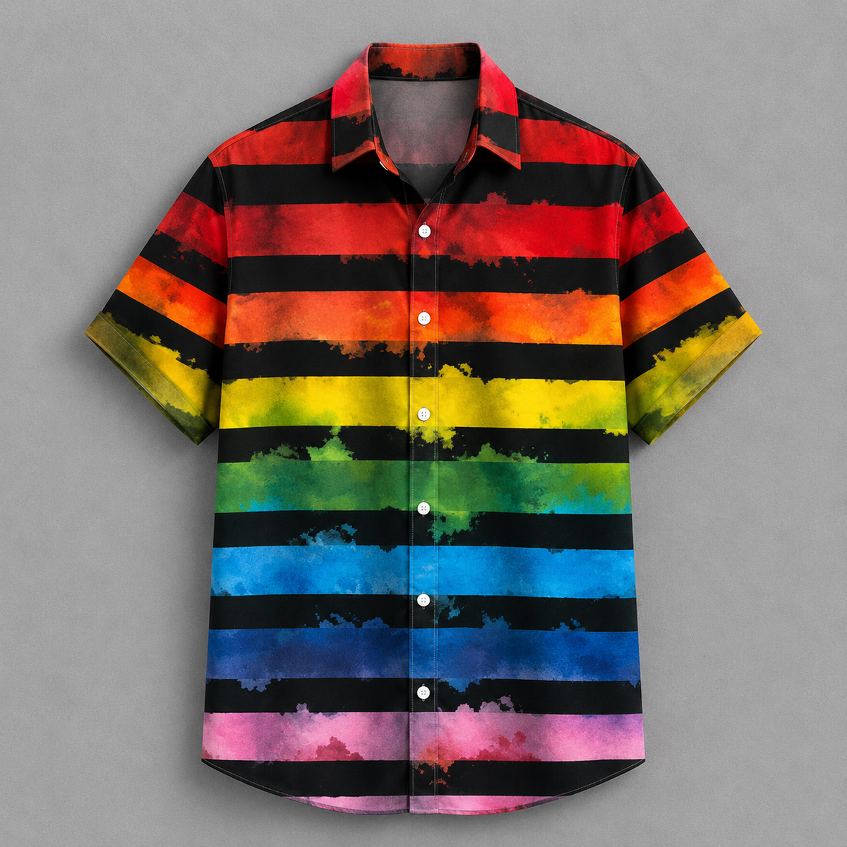 A short-sleeve button-up camp shirt with horizontal rainbow watercolor stripes on a black background, displayed flat against a neutral gray backdrop.