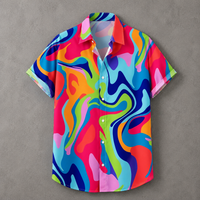 A short-sleeve button-up shirt with a vibrant, multicolored abstract fluid pattern, laid flat against a textured gray background.