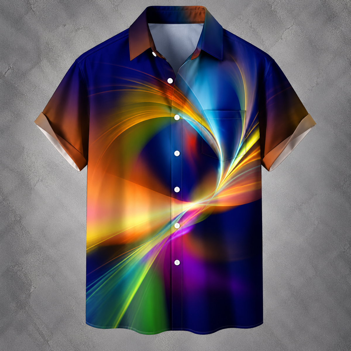 A short-sleeve button-up shirt with a vibrant, abstract multicolor print featuring swirling waves of blue, purple, yellow, orange, and green, displayed against a textured gray background.
