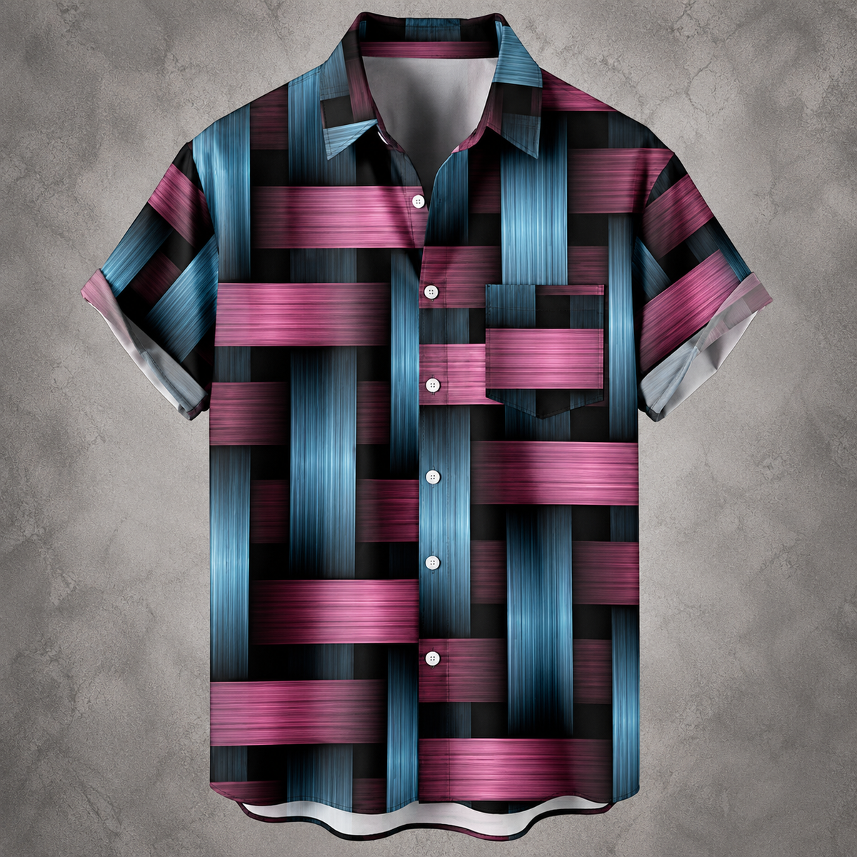A short-sleeve button-up camp shirt with a woven basketweave pattern in shades of blue, pink, and black, displayed against a textured gray background.