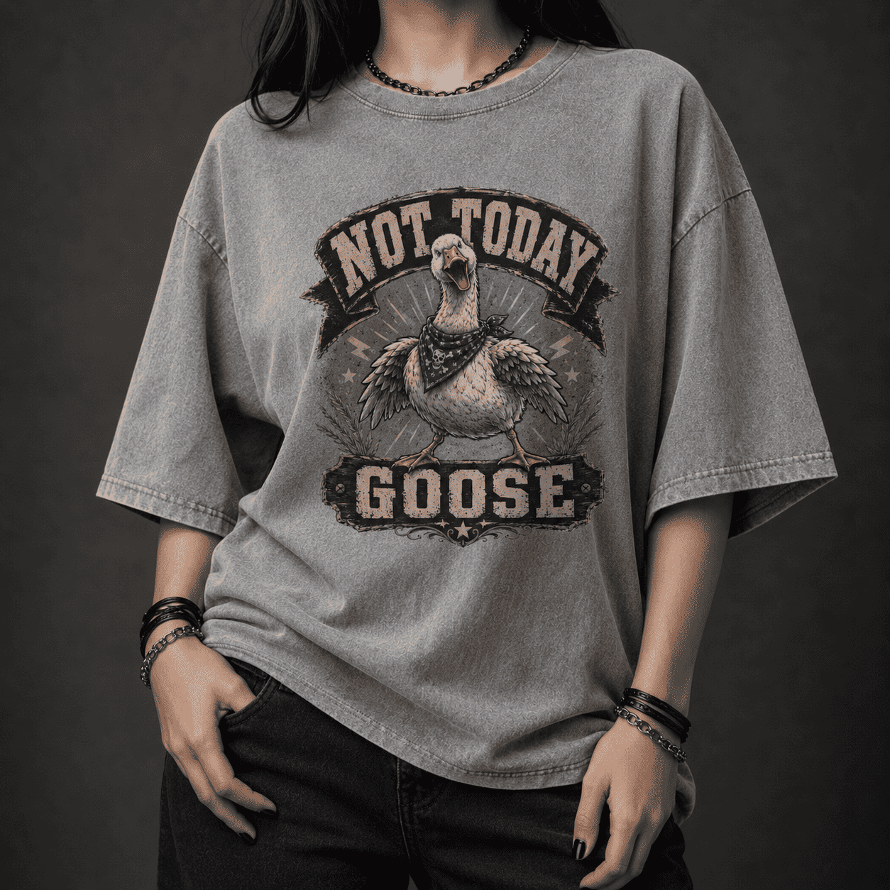 Person wearing a gray t-shirt with 'Not Today Goose' graphic design.