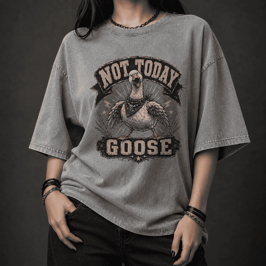 Person wearing a gray t-shirt with 'Not Today Goose' graphic design.