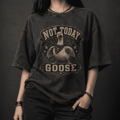 Person wearing a black t-shirt with 'Not Today Goose' graphic design on a dark background