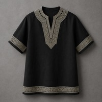 A black short-sleeve tunic top with beige Greek key pattern embroidery on the V-neck, sleeve cuffs, and hem, displayed against a neutral gray background.