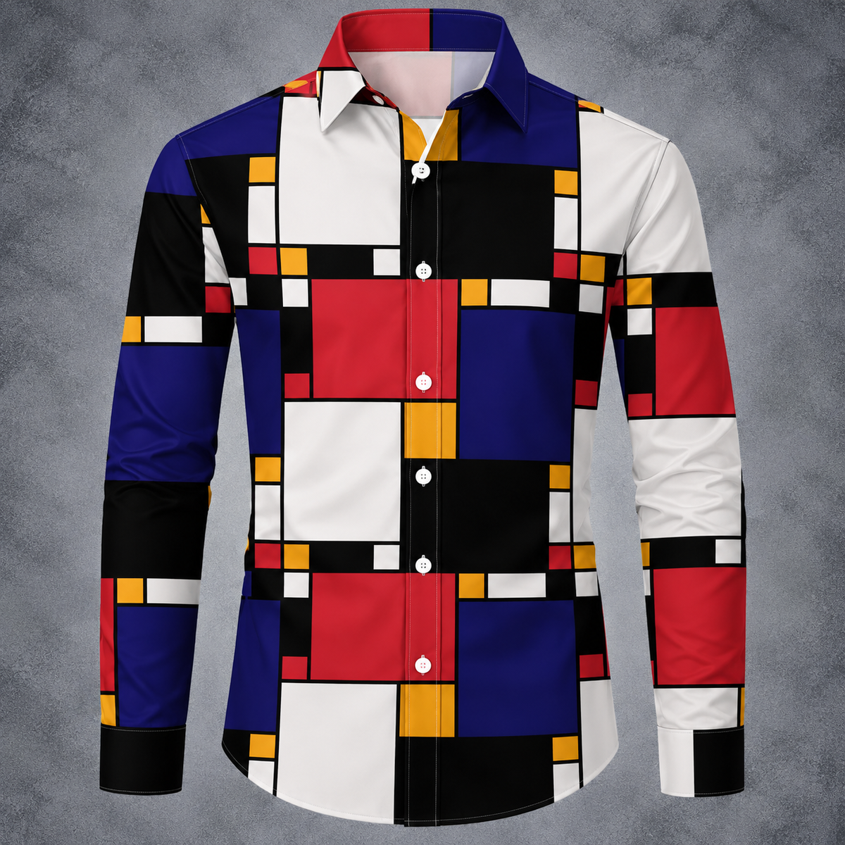 A long-sleeve button-up shirt with a bold geometric block pattern in blue, red, yellow, black, and white, displayed on a gray textured background.