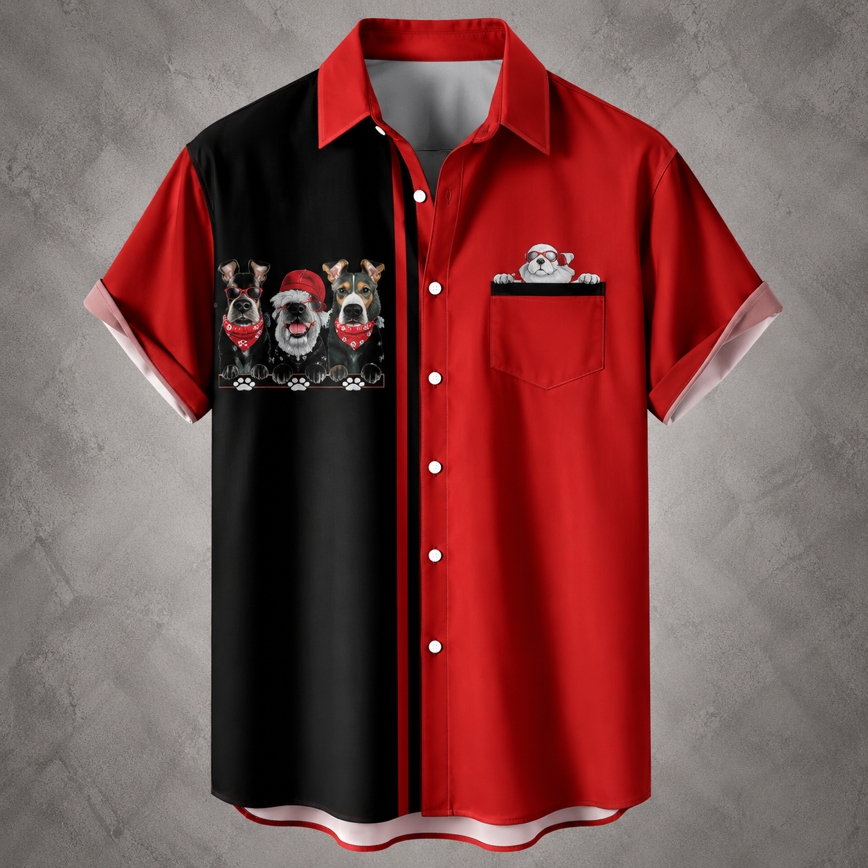 A short-sleeve button-up camp shirt with a split red and black design, featuring dog illustrations on the chest and pocket area, displayed against a textured gray background.