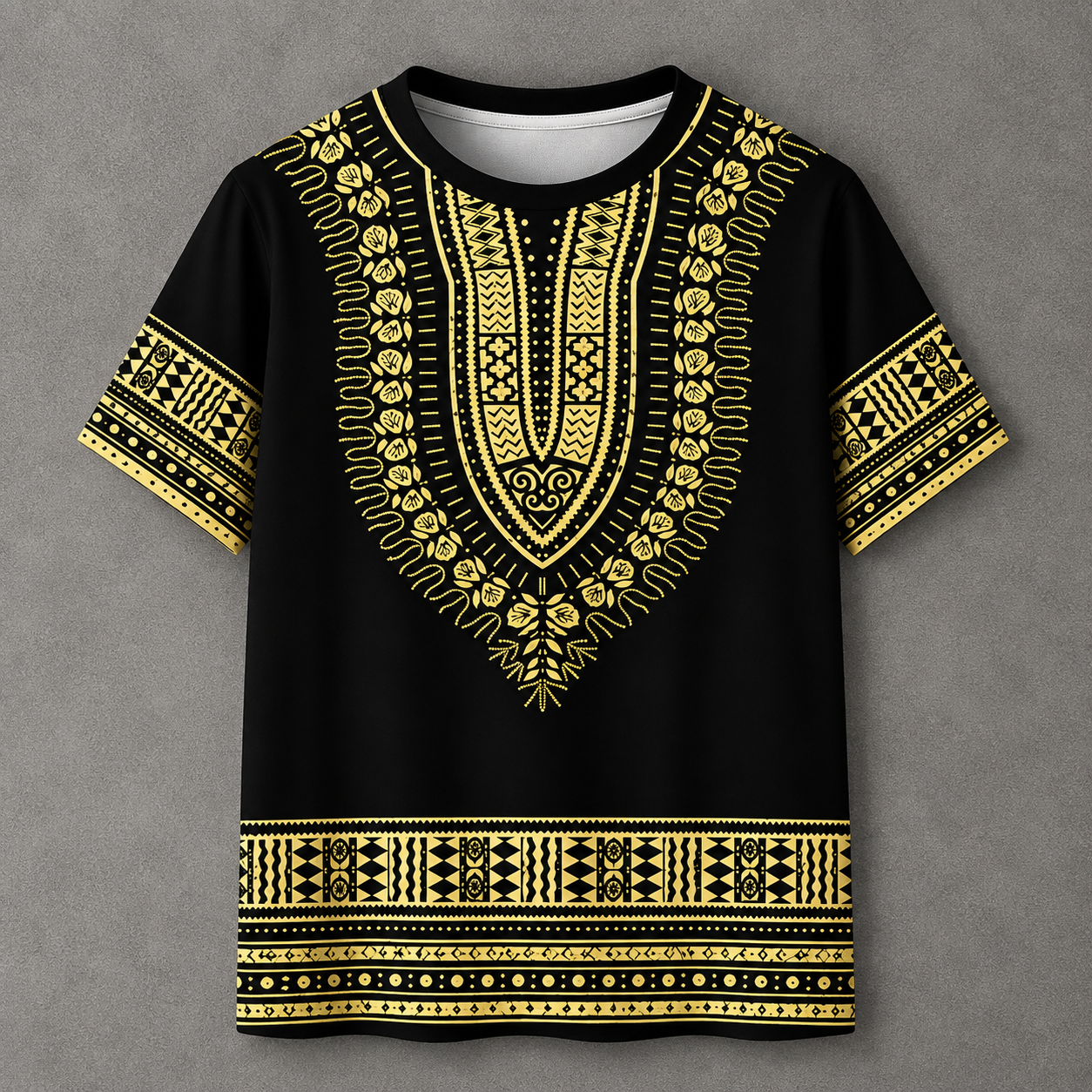 A black short-sleeve t-shirt with an all-over gold African dashiki pattern, featuring a V-neckline, patterned sleeves, and a decorative border at the bottom, displayed flat against a textured gray background.