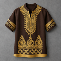 A dark brown short-sleeve tunic top with intricate gold embroidery, featuring a mandarin collar, a split V-neckline, and ornate traditional patterns on the chest, sleeves, and hem, displayed against a textured gray background.