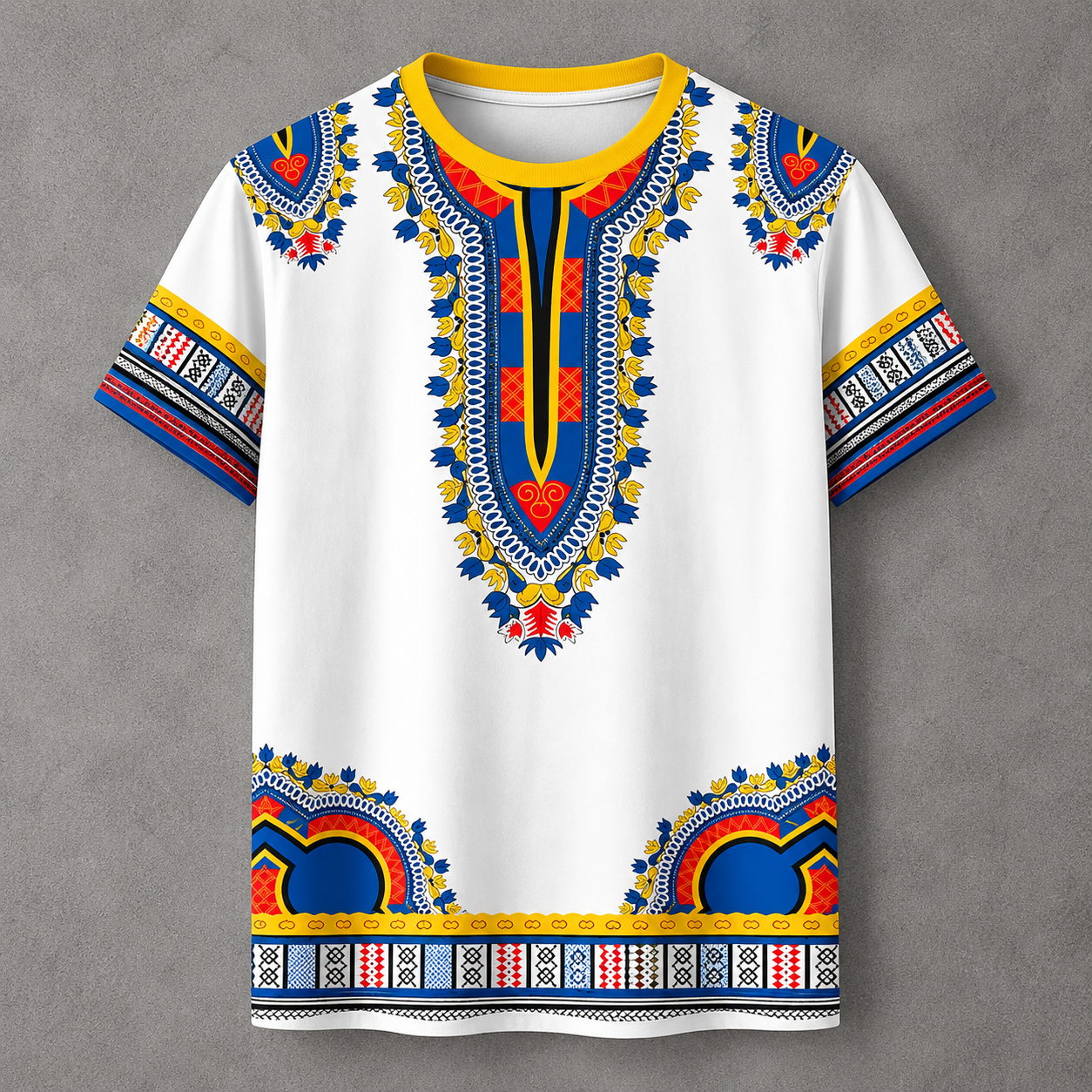 A white short-sleeve t-shirt with a vibrant African dashiki print featuring blue, yellow, and red patterns on the chest, collar, sleeves, and hem, displayed flat against a gray textured background.