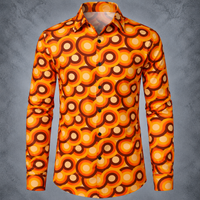 A long-sleeve button-up shirt with a bold retro 70s-style circular concentric pattern in orange, yellow, brown, and cream, displayed on a gray textured background.