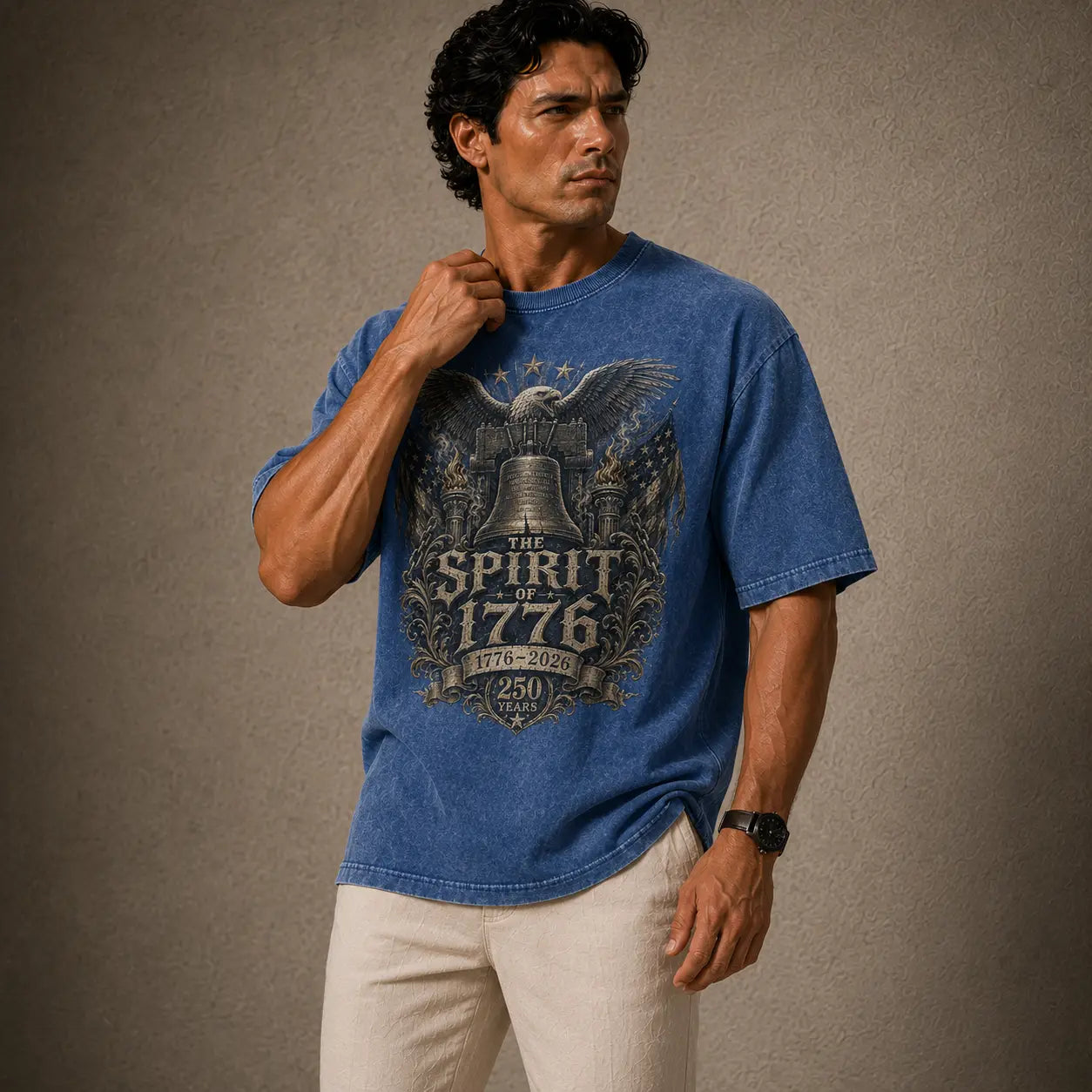 Man wearing a blue t-shirt with a graphic design on a brown background