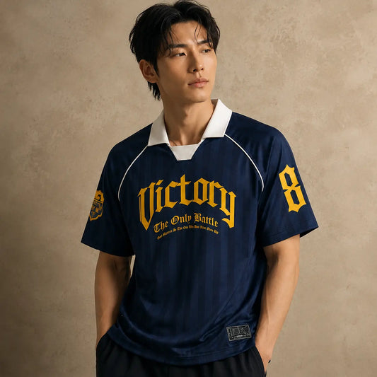 Person wearing a navy blue sports jersey with yellow text and numbers on a beige background