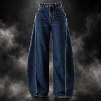 A pair of dark blue wide-leg denim jeans with prominent contrast light stitching down the front of the legs, displayed against a dark studio background with dramatic smoke effects.