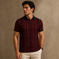 Man wearing a patterned polo shirt against a brown background