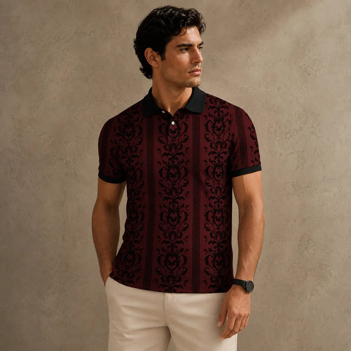Man wearing a patterned polo shirt against a beige background