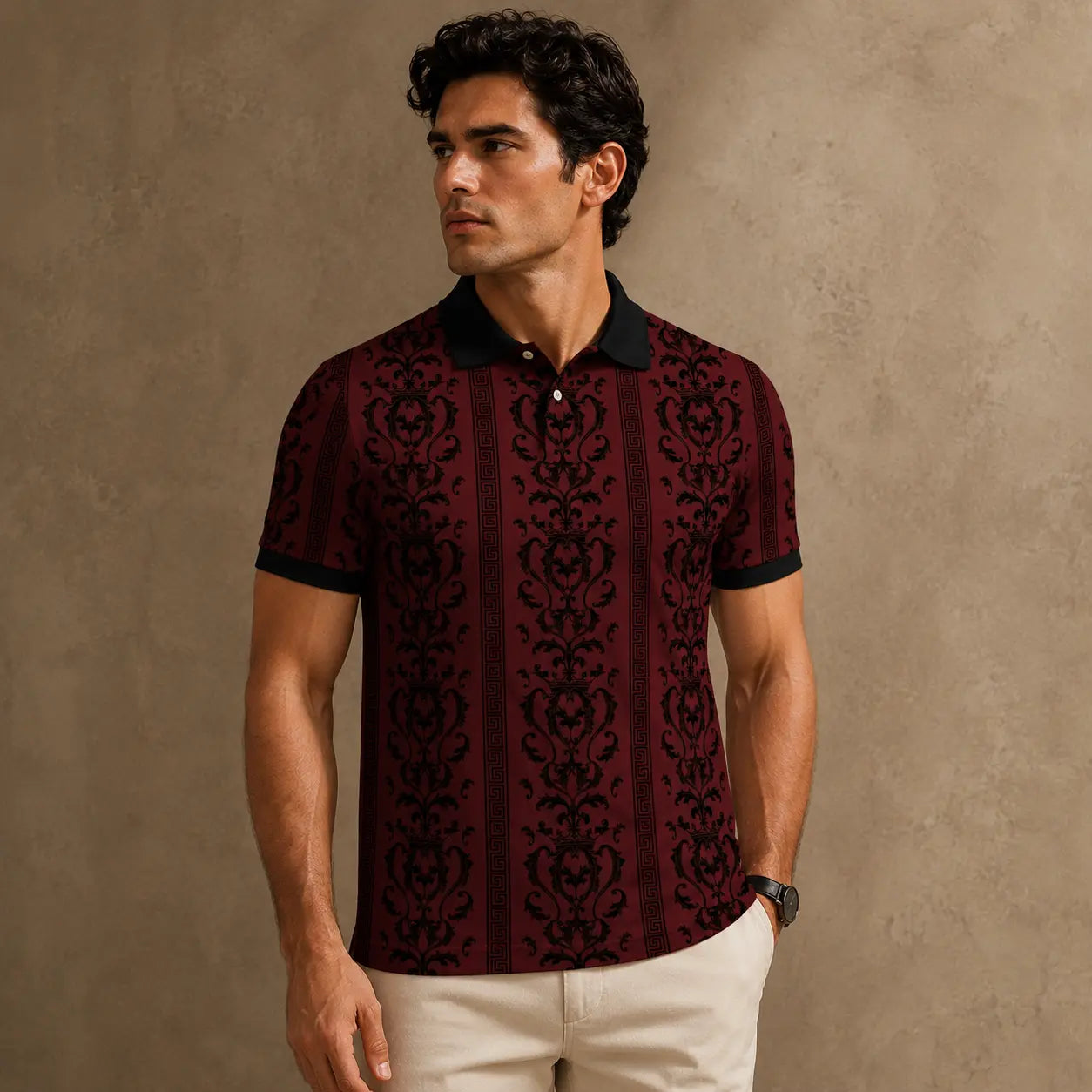 Man wearing a patterned maroon shirt against a beige background