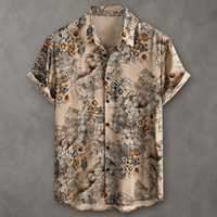 A short-sleeve button-up shirt with a beige base and an intricate, painterly floral and landscape pattern in brown, gray, and muted blue, laid flat against a textured gray background.