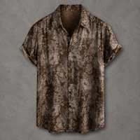 A short-sleeve button-up shirt with a brown and beige distressed, textured pattern, displayed against a textured gray background.