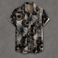 A short-sleeve button-up shirt with a black and gray abstract floral pattern on a textured beige background, displayed flat against a gray backdrop.