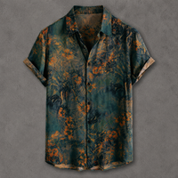 A short-sleeve button-up shirt with a dark teal and orange tropical floral print, displayed flat against a textured gray background.