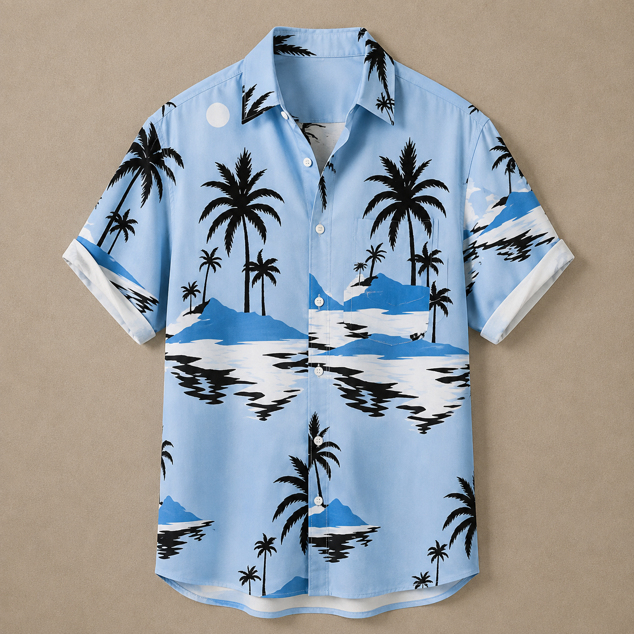 A light blue short-sleeve button-up shirt with a black and white tropical palm tree and beach landscape print, displayed flat against a solid beige background.