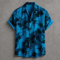 A short-sleeve button-up shirt with a vibrant blue base and a black bamboo and foliage print, displayed flat against a textured gray background.