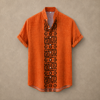An orange short-sleeve linen shirt with a black geometric pattern down the center front, displayed flat against a textured beige background.