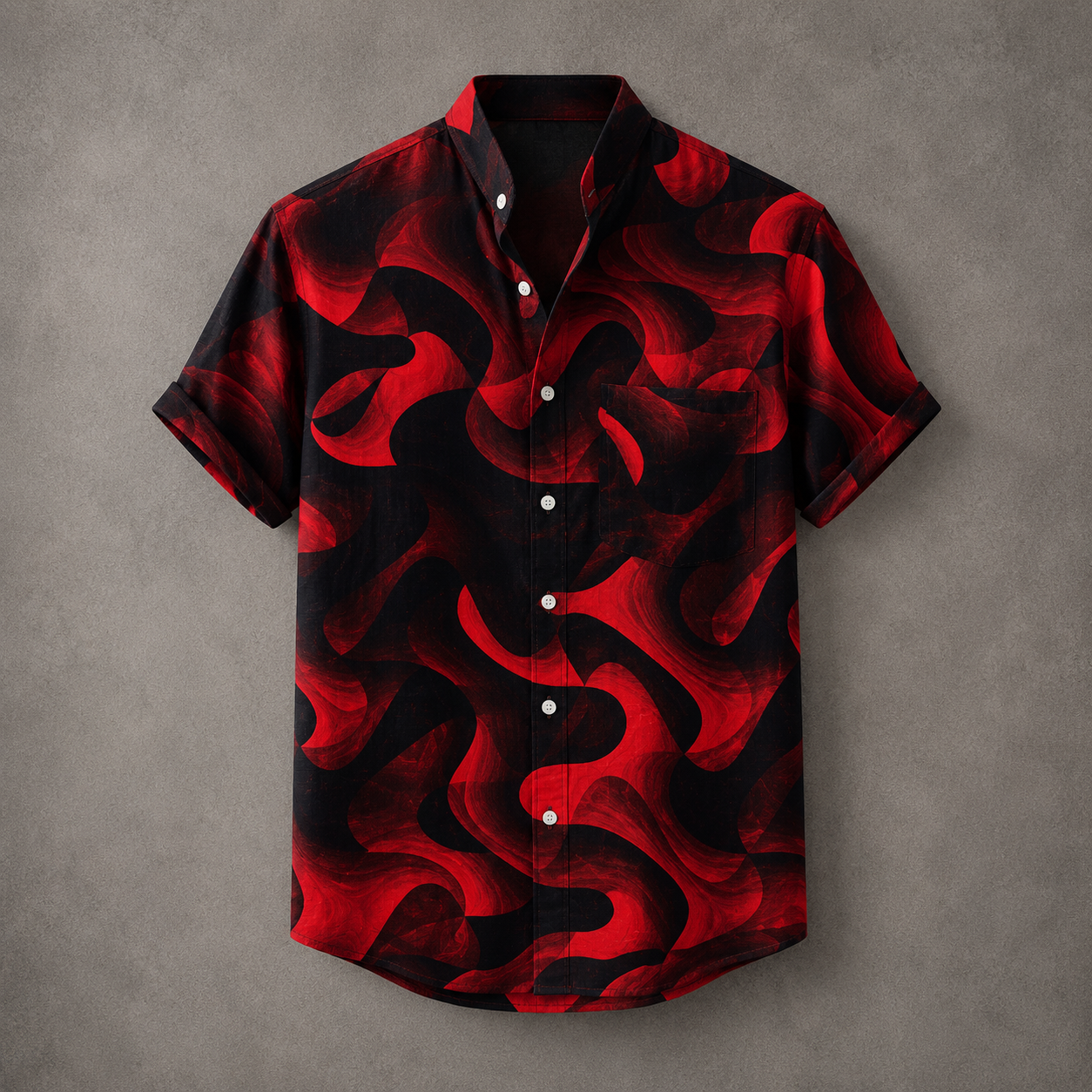 A short-sleeve button-up shirt with a bold red and black abstract wavy pattern, displayed flat against a textured gray background.