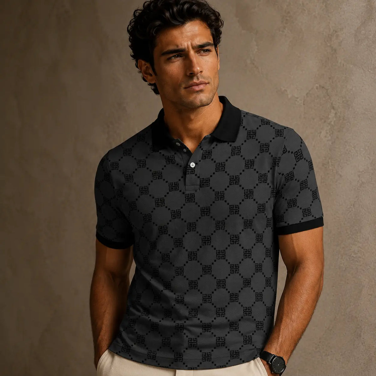 Man wearing a black patterned polo shirt against a brown background