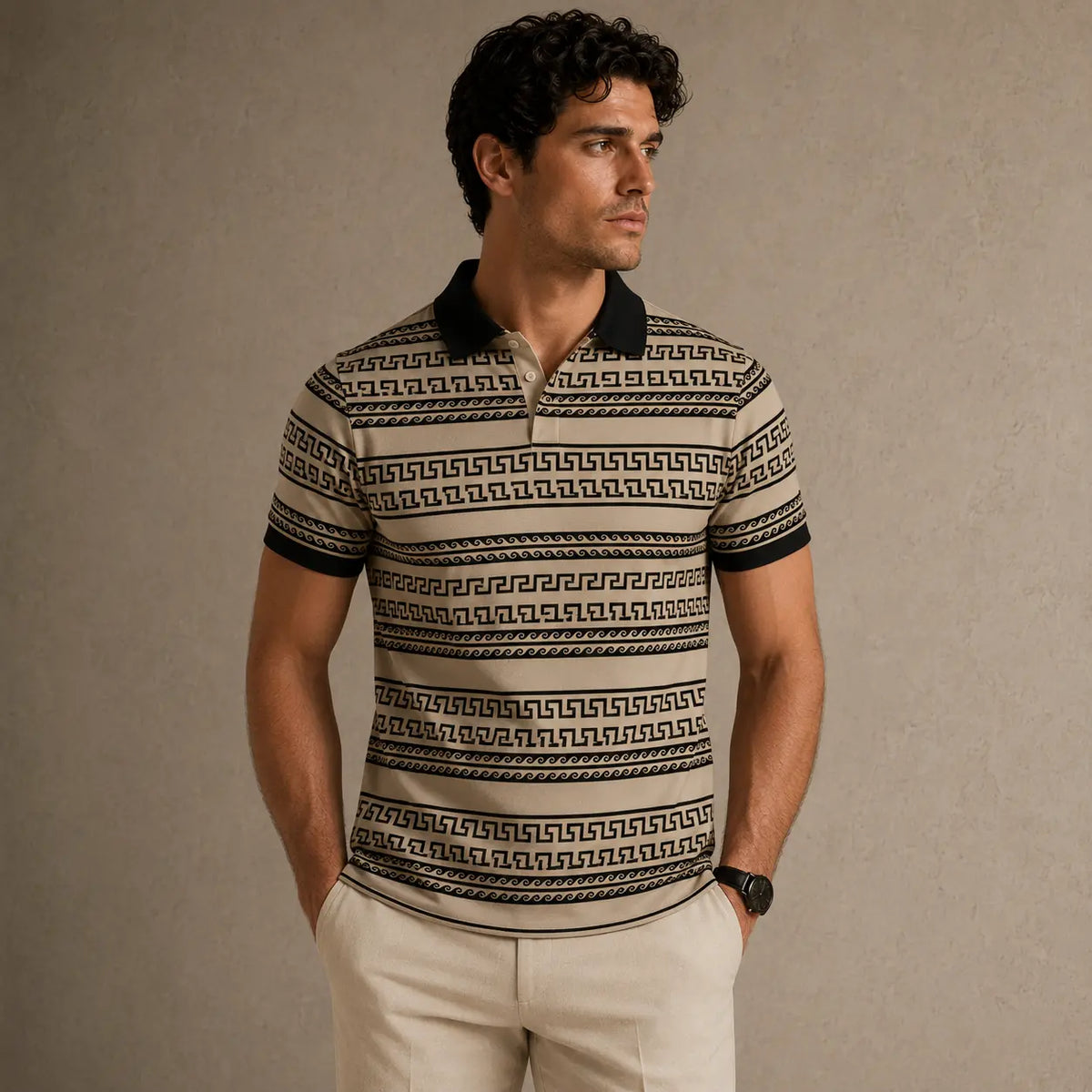 Man wearing a patterned polo shirt against a beige background