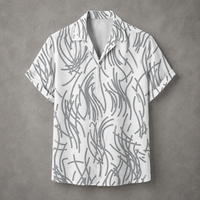 A short-sleeve button-up camp shirt with a white base and a gray abstract scribble pattern, displayed flat against a textured gray background.