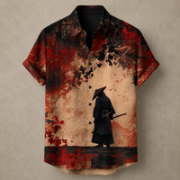 A short-sleeve button-up shirt with a Japanese samurai graphic print, featuring a black-clad figure with a conical hat against a textured beige background with red splatters and black brushstrokes.