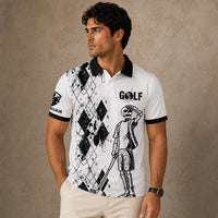 Man wearing a white polo shirt with black graphics and text on a beige background
