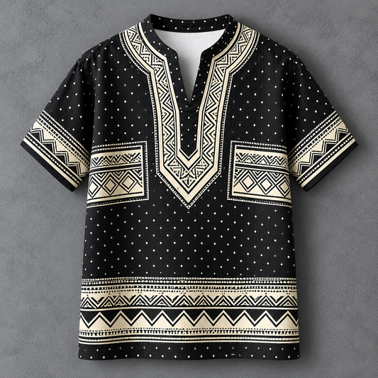 A men's short-sleeve t-shirt with a black base and cream-colored geometric patterns, including a V-neckline, chest pockets, and a horizontal band near the hem, displayed flat against a textured gray background.